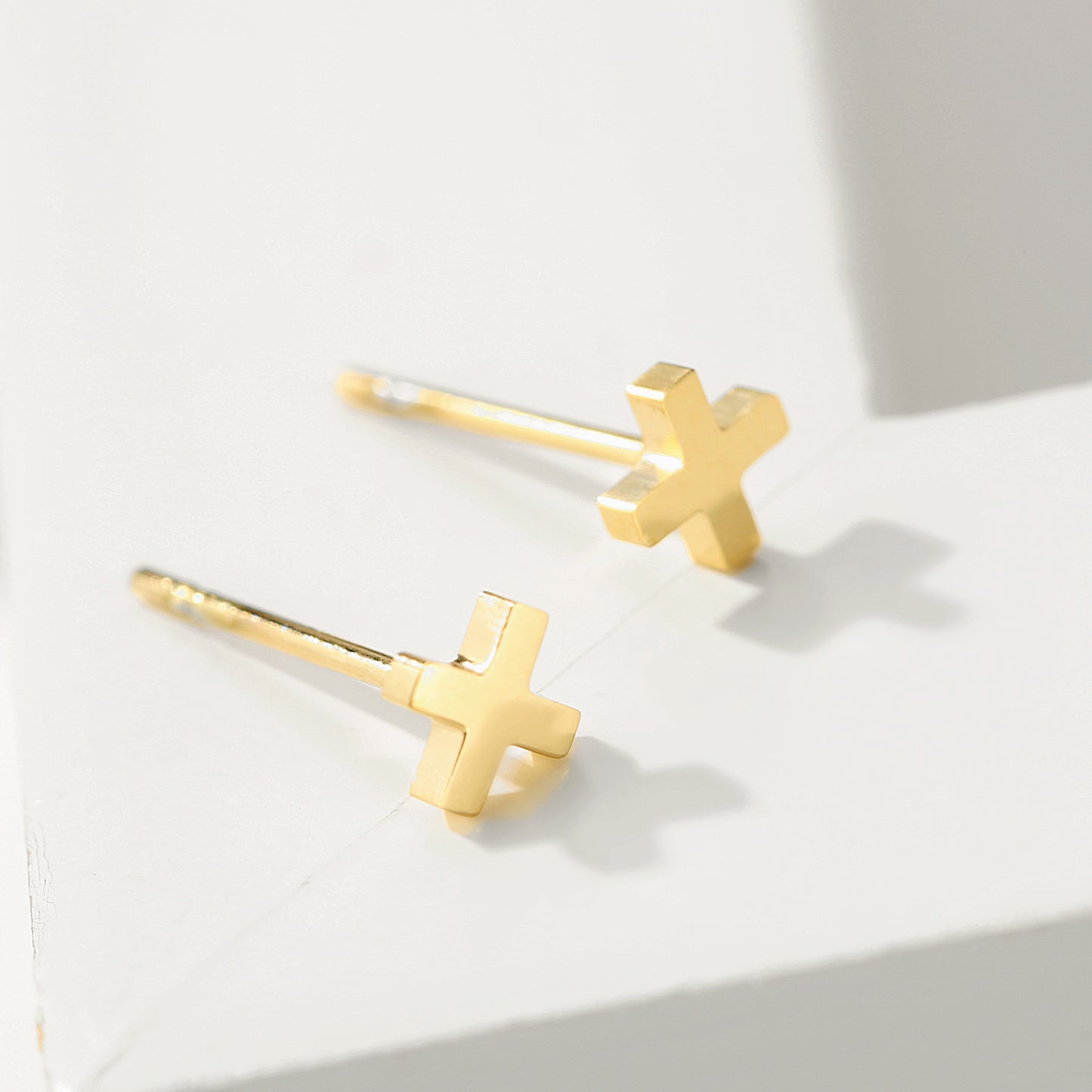 X Stud Earrings