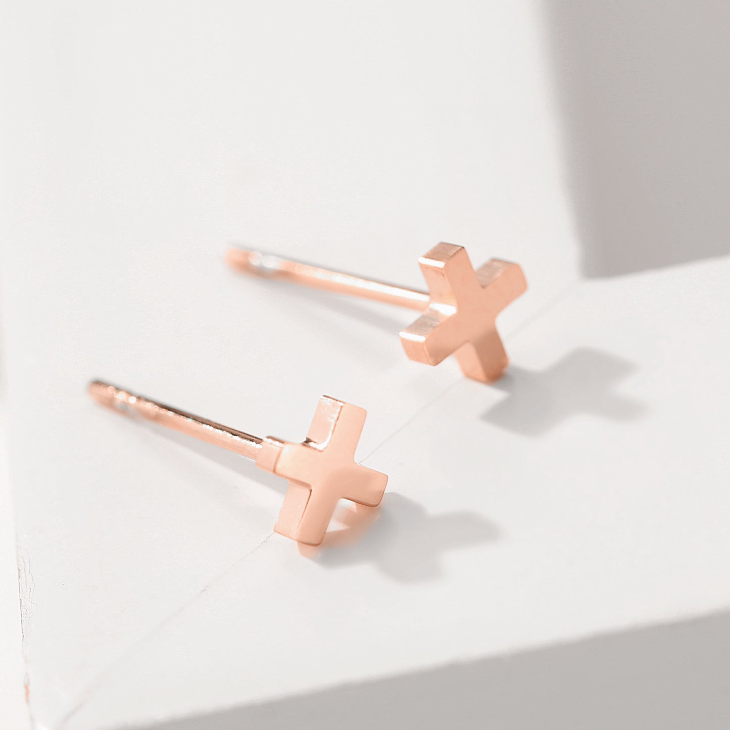 X Stud Earrings